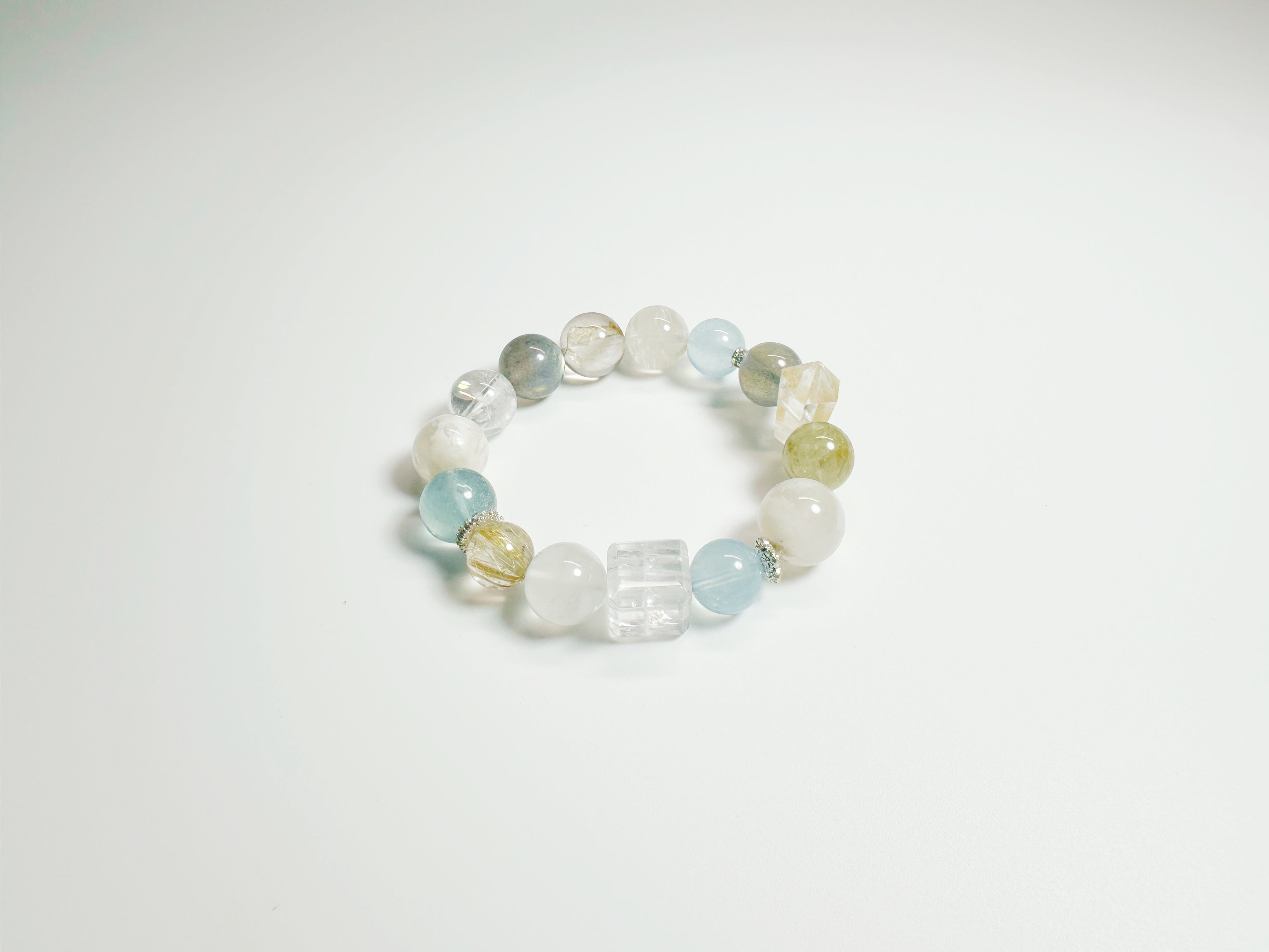 Rainbow Crystal Bracelet for love & peace – 7 chakra stones aligned with Bazi elements. Hand-blessed at Baiyun Temple for energy harmony. 