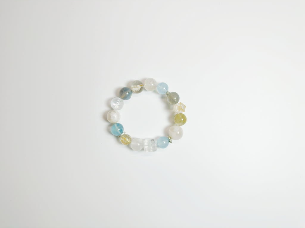 Rainbow Crystal Bracelet for love & peace – 7 chakra stones aligned with Bazi elements. Hand-blessed at Baiyun Temple for energy harmony. 