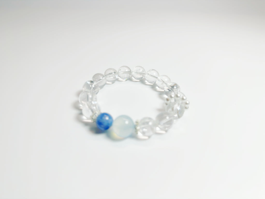 Feng Shui -Clear Quartz -Kyanite  -Alternating clear quartz and icy-blue kyanite cylinders create a glacier-cool palette that pairs effortlessly with office or evening wear. Enhances clarity & peaceful energy.