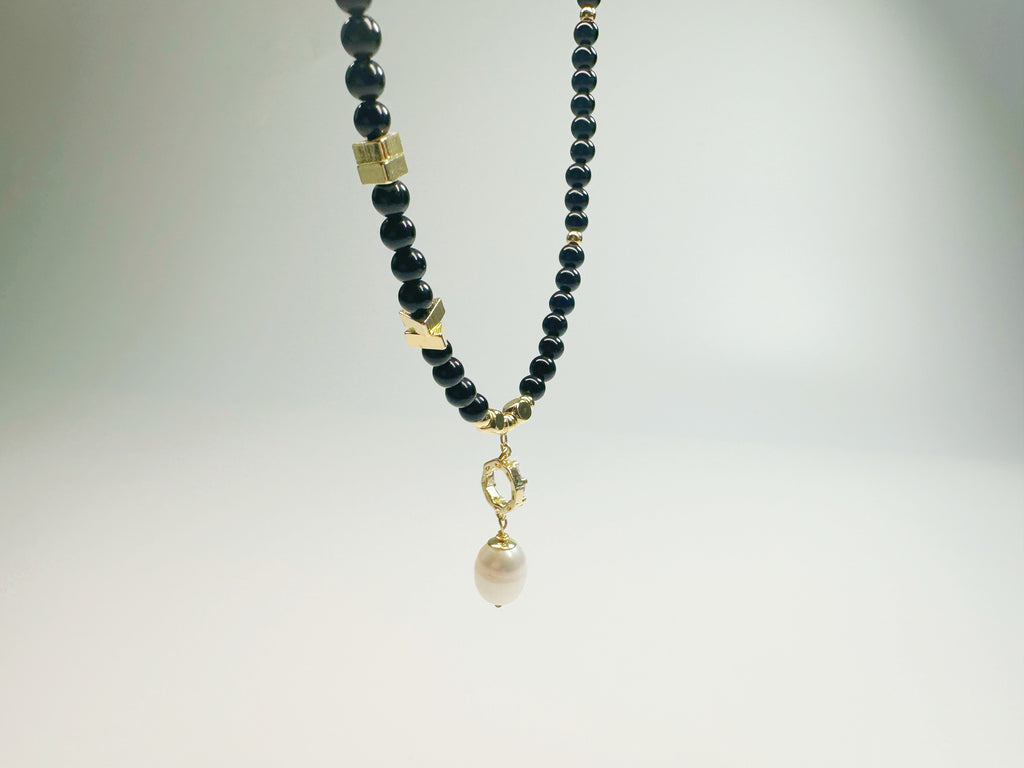 The Jìng(静):  Feng Shui Black Agate & Pearl bracelet for protection + intuition boost. Hand-polished metaphysical talisman with optional Baiyun Temple blessing. Shields against negative energy .