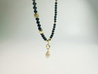 The Jìng(静):  Feng Shui Black Agate & Pearl bracelet for protection + intuition boost. Hand-polished metaphysical talisman with optional Baiyun Temple blessing. Shields against negative energy .