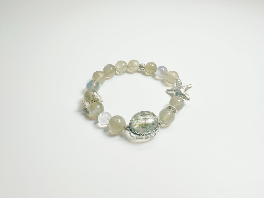 Feng Shui Stone & moonstone garden pendant with tourmaline quartz. Combines silver moonstone clarity + green tourmaline protection. Optional Baiyun Temple blessing for cosmic energy alignment.
