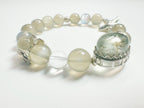 Feng Shui Stone & moonstone garden pendant with tourmaline quartz. Combines silver moonstone clarity + green tourmaline protection. Optional Baiyun Temple blessing for cosmic energy alignment.